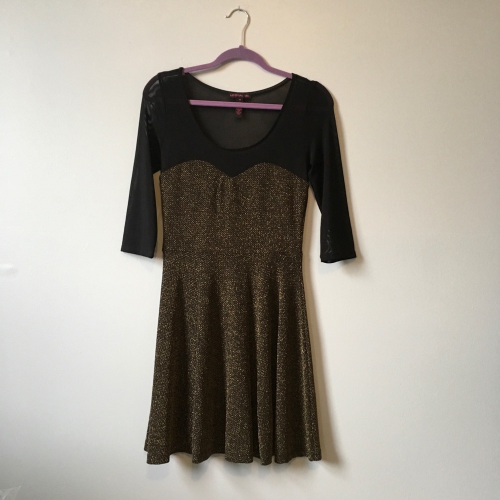 Illusion neckline gorgeous metal gold black dress.